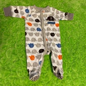 Three newborn footie pajamas